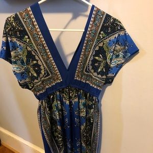 Blue dress with brown, green and white patterns